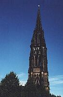 
   Turm der Nikolaikirche -   
   an der Ost-West-Straße   
